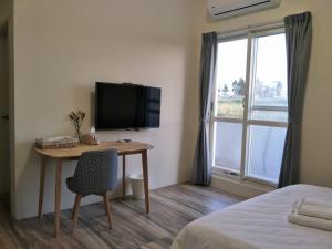 TV a/nebo společenská místnost v ubytování Good moment B&B