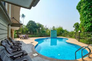 Bazén v ubytování Luxury Aveeno Resort Near Calangute and Baga nebo v jeho okolí