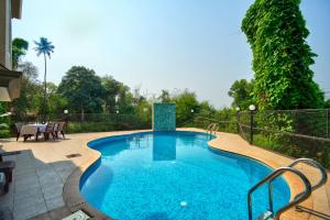 Bazén v ubytování Luxury Aveeno Resort Near Calangute and Baga nebo v jeho okolí