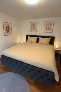 Ένα ή περισσότερα κρεβάτια σε δωμάτιο στο Ferienhaus am Bodensee