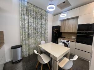 Dapur atau dapur kecil di Уютное Гнездышко
