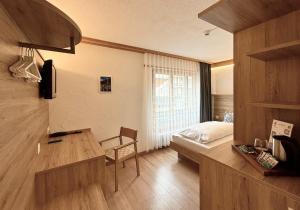 TV a/nebo společenská místnost v ubytování Hotel Crystal