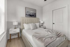 Postel nebo postele na pokoji v ubytování Sanctuary Family Friendly 3 Bed Oasis + 50 fotografií