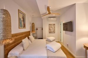 Postel nebo postele na pokoji v ubytování INNER Hostal Es Molí