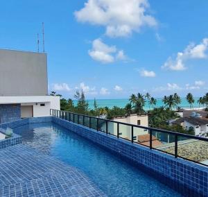 Kolam renang di atau dekat dengan MaracasFlat +16 gambar