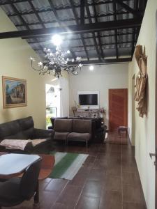 TV a/nebo společenská místnost v ubytování Casa de Campo proximo a Juiz de Fora MG- granjaerralugueld