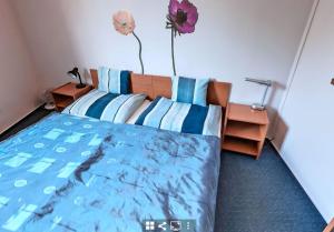 Postel nebo postele na pokoji v ubytování Tímárház Magánszálláshely + 22 fotografií