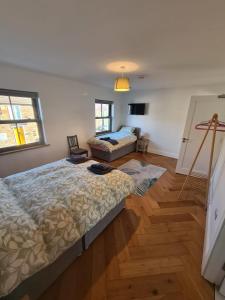 Postel nebo postele na pokoji v ubytování Lavarna House