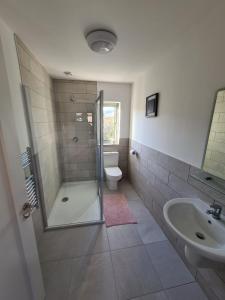 Koupelna v ubytování Lavarna House + 11 fotografií