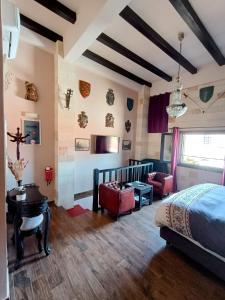 Posteľ alebo postele v izbe v ubytovaní Grand Master Suite