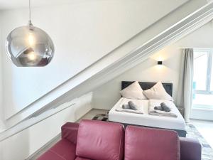 Letto o letti in una camera di Loft apartment in a central location
