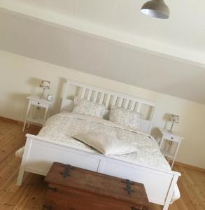 Postel nebo postele na pokoji v ubytování Vakantiewoning Huys op de Locht + 2 fotografie