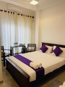 Postel nebo postele na pokoji v ubytování Villa Lavish + 37 fotografií