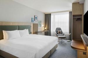 Postel nebo postele na pokoji v ubytování Courtyard by Marriott Zurich North + 37 fotografií