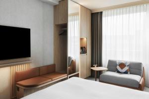TV o dispositivi per l'intrattenimento presso Courtyard by Marriott Zurich North