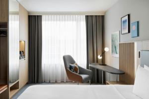 Letto o letti in una camera di Courtyard by Marriott Zurich North