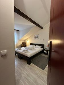 Postel nebo postele na pokoji v ubytování Apartments & Accommodation Stojic