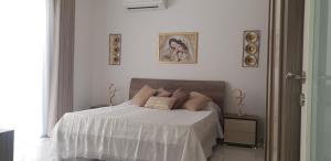 Postelja oz. postelje v sobi nastanitve Eivissa Apartment