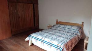 Postel nebo postele na pokoji v ubytování Hostel La Bodega