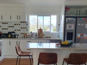 Cucina o angolo cottura di Otumoetai Shared Family Home - Sherwood Food Forest, New Zealand