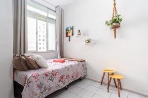 Ένα ή περισσότερα κρεβάτια σε δωμάτιο στο Studio no Flamengo - RJ