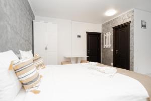 Ліжко або ліжка в номері Grey Boutique Hotel Palas