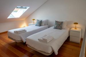 Postel nebo postele na pokoji v ubytování Casa dos Remedios