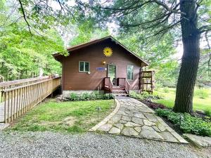 Κήπος έξω από το Woodland Hideaway