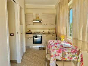 Kuchyň nebo kuchyňský kout v ubytování Hotel Soleado