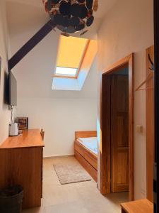 Postel nebo postele na pokoji v ubytování Hotel & wellness Hejtmanka
