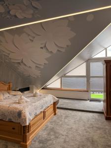 Postel nebo postele na pokoji v ubytování Hotel & wellness Hejtmanka