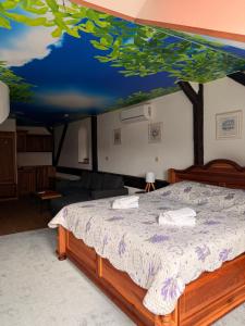 Postel nebo postele na pokoji v ubytování Hotel & wellness Hejtmanka