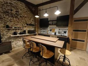 Fotografie z fotogalerie ubytování Grange rénovée dans cour privée avec jardin sur les remparts v destinaci Bergheim