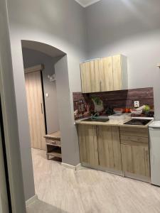 Η κουζίνα ή μικρή κουζίνα στο Apartament Wikoli 2
