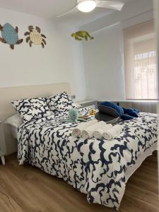 Ένα ή περισσότερα κρεβάτια σε δωμάτιο στο La casita de la playa