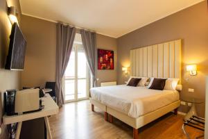 Posteľ alebo postele v izbe v ubytovaní Album Boutique Rooms