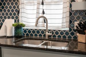 a kitchen counter with a sink in a kitchen at Plaza Pad II-Near Plaza District in Oklahoma City +15 photos