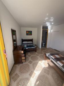 Ένα ή περισσότερα κρεβάτια σε δωμάτιο στο Habitación privada brisas de salento