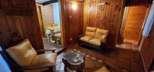 Posezení v ubytování Cabañas Lucero del Bosque