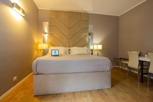 Posteľ alebo postele v izbe v ubytovaní Album Boutique Rooms