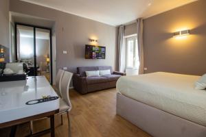 Posteľ alebo postele v izbe v ubytovaní Album Boutique Rooms