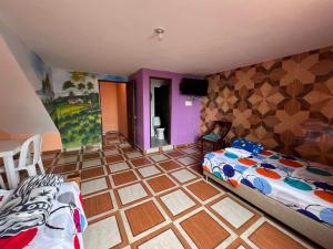 Postel nebo postele na pokoji v ubytování Hotel del Parque Támesis