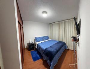 Postel nebo postele na pokoji v ubytování Hotel Dorado - Cerca al Aeropuerto - Habitación 201