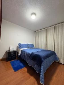 Postel nebo postele na pokoji v ubytování Hotel Dorado - Cerca al Aeropuerto - Habitación 201