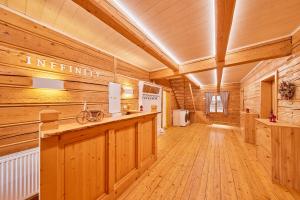 Fotografia z galérie ubytovania Wellness roubenka Inffinity v destinácii Žacléř