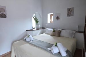 Letto o letti in una camera di Ronciglione Home di F & E