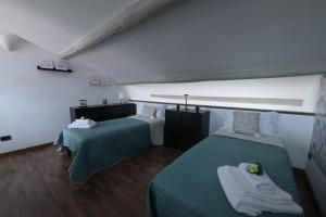 Letto o letti in una camera di Ronciglione Home di F & E