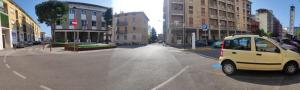 a small car is parked in a parking lot at airport room -1 in Azzano San Paolo