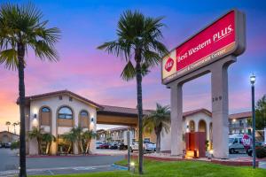 a mobil oil gas station with palm trees in front at Best Western Plus Ontario Airport & Convention Center in Ontario