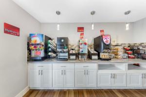 a counter in a store with food and drinks at Best Western Plus Ontario Airport & Convention Center in Ontario